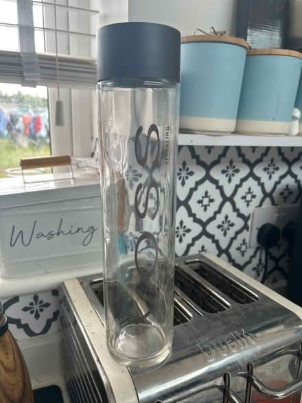 Photo of free Tall glass bottle (OX1 henwood) #1