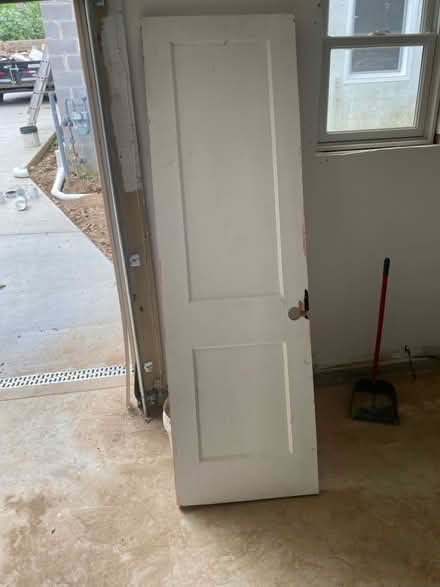 Photo of free Interior slab door 24”x77 1/2” (S. 26th St. & S. Ives St) #1