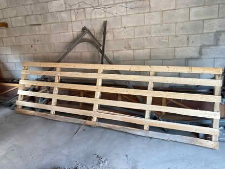 Photo of free Long wooden skid/pallet (Little Italy) #1