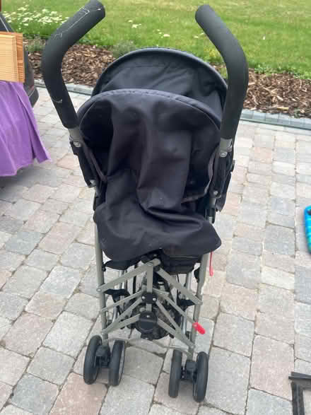 Photo of free Black fold away buggy (Stanway, CO3) #2