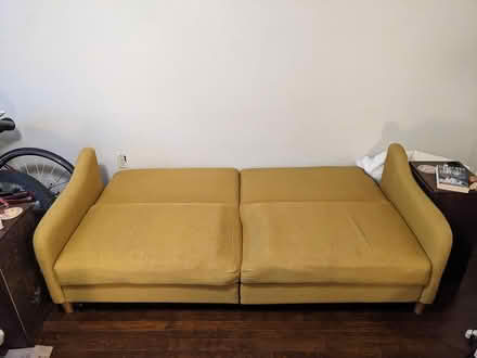 Photo of free Yellow fold out couch (Kingman Park) #2