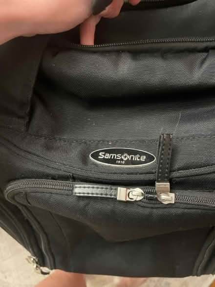 Photo of free Suitcase (1 wheel needs repair) (108 and Broadway) #3