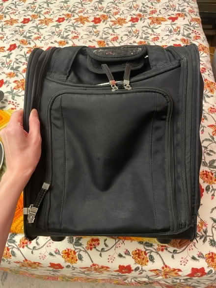 Photo of free Suitcase (1 wheel needs repair) (108 and Broadway) #2
