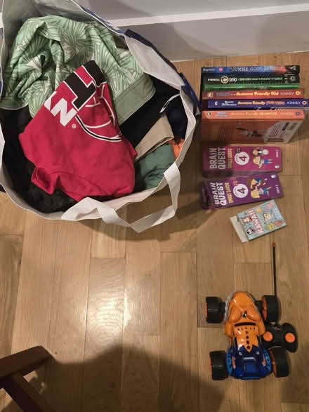 Photo of free Big Kid Clothes & Books (Washington Heights) #1