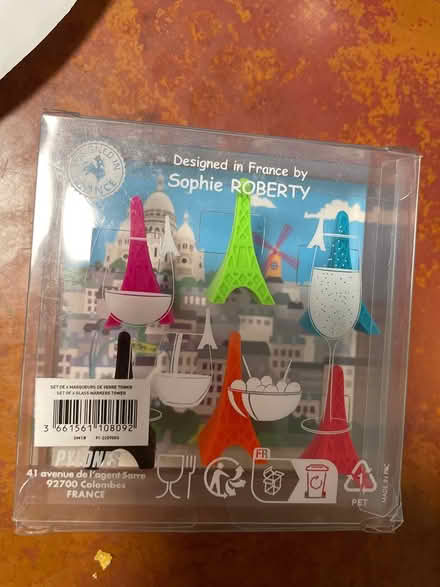Photo of free Eiffel Tower shaped glass charms (11201, near the Vine Bar) #1