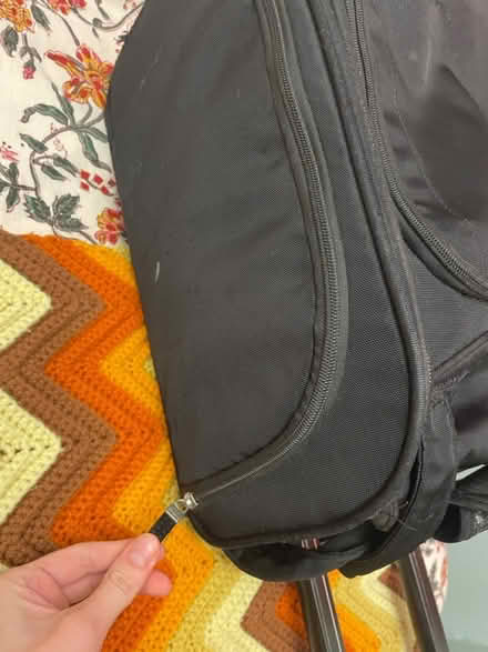Photo of free Suitcase (1 wheel needs repair) (108 and Broadway) #4