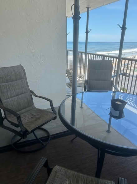 Photo of free Round glass top table and 4 chairs (Daytona Beach Shores) #2