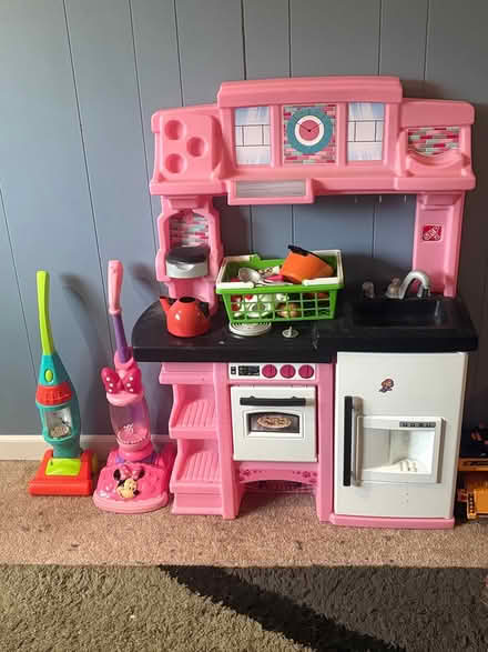Photo of free Children's kitchen and toy vacuums (East Medford) #1