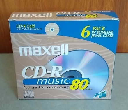 Photo of free Unopened 6-pack of Maxell Gold CD-R disks in slimline jewel cases #1