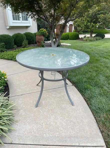 Photo of free Round outdoor table glass top (West olathe) #1