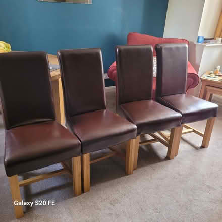 Photo of free Leather chairs x4, oak legs (Cottingham) #2