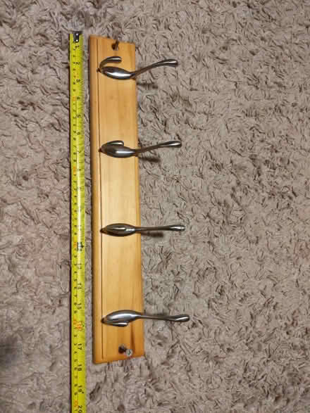 Photo of free Four hooks on wood (Freehold LA1) #1