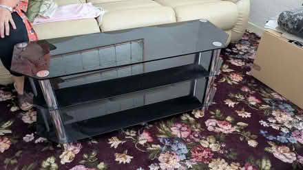 Photo of free Black glass TV stand. (Holmes FY5) #1