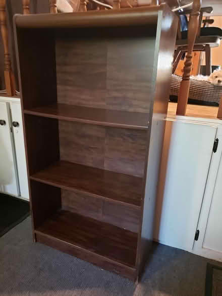 Photo of free Laminated brown wood shelf unit (Easthampton, Ma) #1