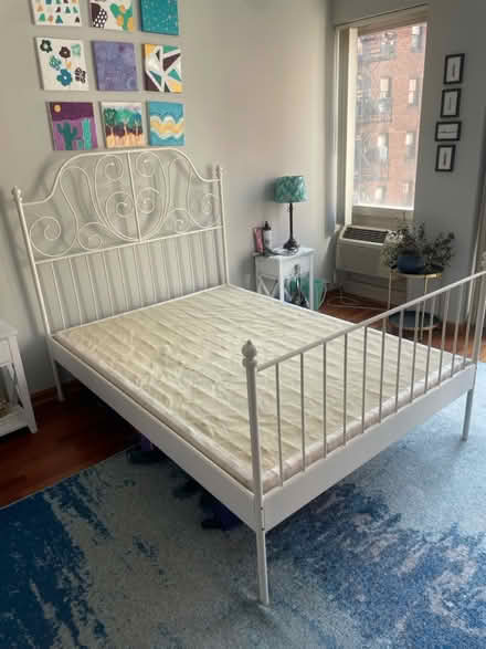 Photo of free Full Size Bed Frame and Box Spring (Parking garage 2933 N Sheridan) #1