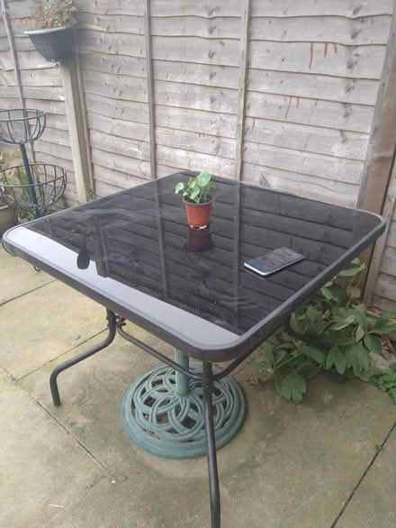 Photo of free Glass top patio table (DE23 sinfin) #1