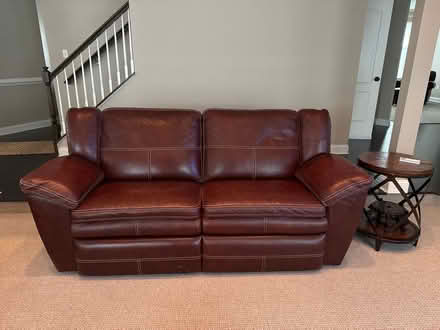 Photo of free Leather reclining sofa and ottoman (Bear / New Castle area) #1
