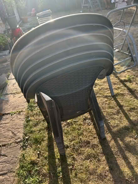 Photo of free 6 plastic garden chairs (UB7 9EF) #2