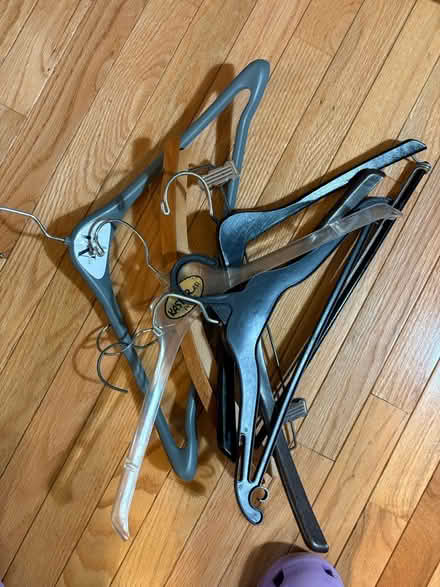 Photo of free Sturdy wood and plastic hangers (Highland Park) #1