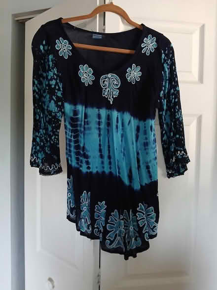 Photo of free women's clothes (Woodridge-near 75th and Janes) #3