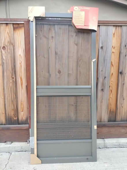 Photo of free new screen door (never used) (Off Bernardo and El Camino) #1