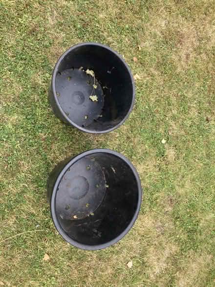 Photo of free 2 large black plastic garden tubs (Old Radnor LD8) #1