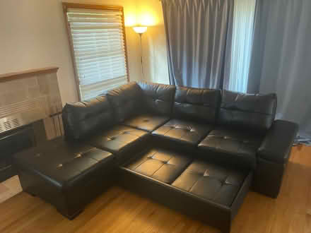 Photo of free black leatherette couch trundle (maple leaf lake city way) #1