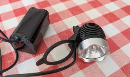 Photo of free Bike light and battery (non-working battery) (Kennington OX1) #1