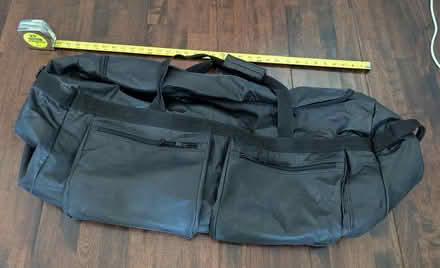 Photo of free Large black duffle bag (94040) #1
