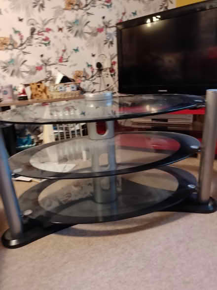 Photo of free Glass t.v. unit, with three shelves (Manningtree) #3