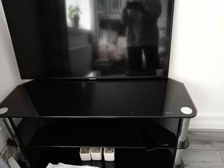 Photo of free Black glass TV unit (Manchester M20) #1