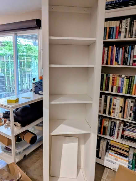 Photo of free Tall wood shelves (Ellicott City) #1