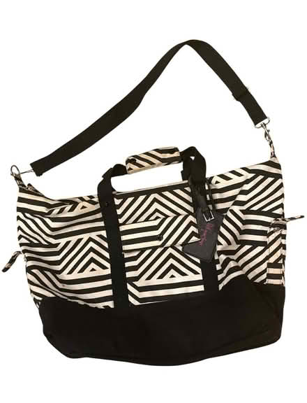 Photo of free Pink Lining Duffel Bag (Brooklyn Storage) #1