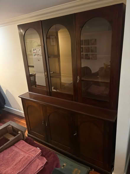Photo of free Three Door Bookshelf (Alexandria 2015) #1