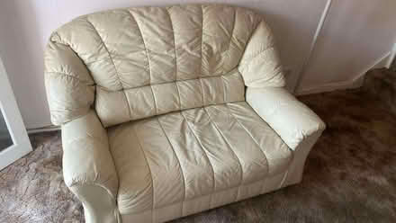 Photo of free 2 seater white leather sofa (Toddington LU5) #1