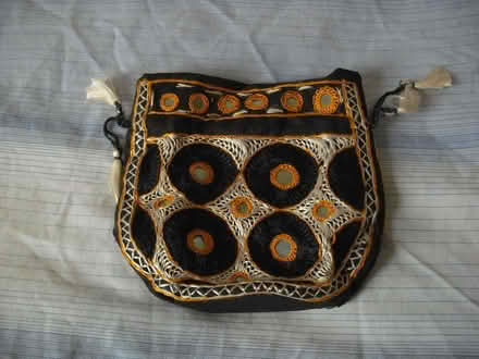 Photo of free Indian Traditional Potli Bag with Round Mirrors for Women (Grange Court E10) #1