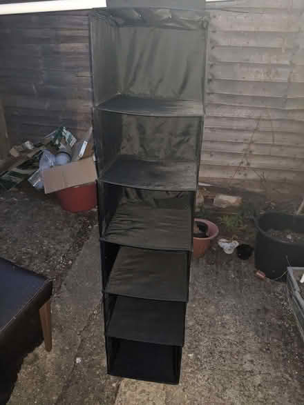 Photo of free Black hanging unit. Good condition . (Old Woking GU22) #1