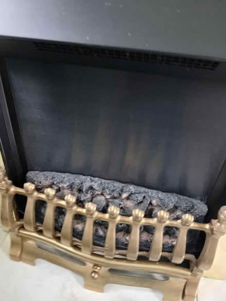 Photo of free Fire surround with electric fire (Ts19 Hardwick) #2