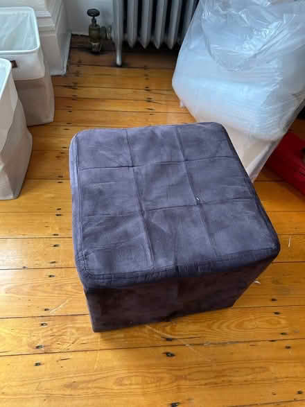 Photo of free Black Ottoman w/ Internal Storage (Newbury St., Back Bay) #1