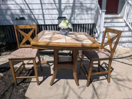 Photo of free CurbAlert: Table, chairs, Flowers (02144) #1