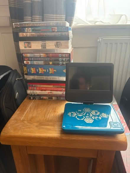 Photo of free Portable DVD player, and DVDs (gobowen) #1