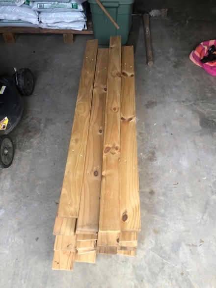 Photo of free (36) 1x4 boards, pressure treated (West Cary) #1