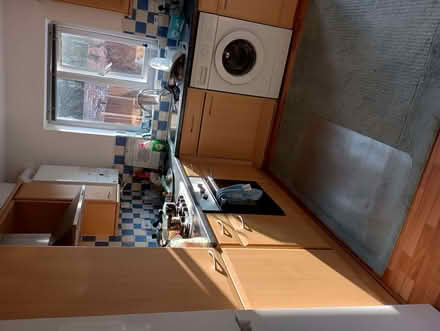 Photo of free Two teal blue wool rugs (Urmston M41) #2