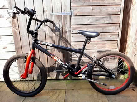 Photo of free Children's Black/Red Bike (Brookwood GU21) #1