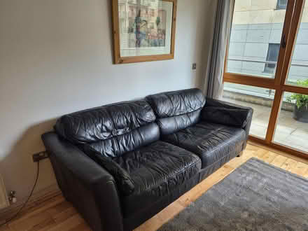 Photo of free Black leather sofa (Stepaside) #1