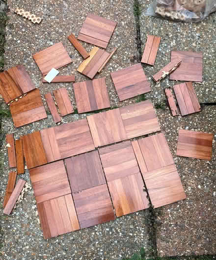 Photo of free Very small amount of small wooden floor tiles. (Eastbourne BN21) #1