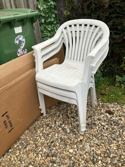 Photo of free 7 white plastic chairs (Thurton NR14) #2