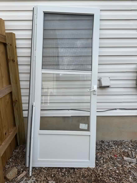 Photo of free Storm door w/ hardware and screen (Shannon Airport/Sylvania Hts) #1