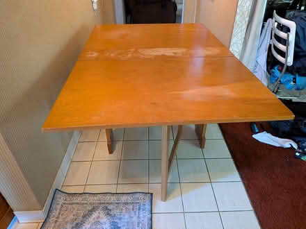 Photo of free Drop leaf wooden table (Pickwick/Greenspring Shop Ctr) #1