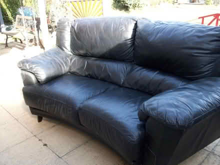 Photo of free Black leather 2/3 seat settee (Castor / peterborough) #2